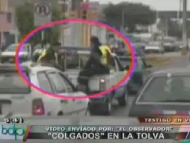 Foto denuncia: Serenos del Callao viajan colgados de la tolva de un vehículo
