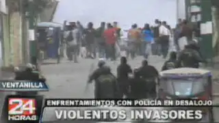 Ventanilla: invasores se enfrentan a policías para evitar desalojo