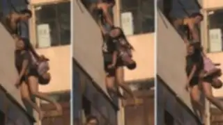 VIDEO: Hombre salva a suicida apunto de caer desde un quinto piso en China