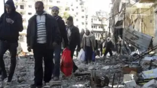 Siria: Miles de ciudadanos esperan reinicio de evacuación en Homs