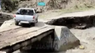 Huari: río se llevó viviendas y dejó puente a punto de colapsar