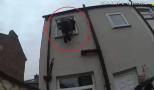 FOTOS: ladrón queda atrapado en ventana de casa que quería robar