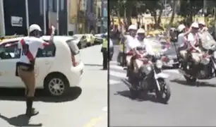 Ica: policía dirige tránsito con camiseta de Perú
