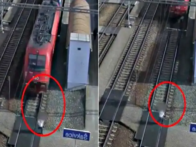 Mujer distraída con su celular casi muere atropellada por tren