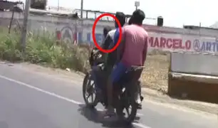 Trujillo: niño y tres hombres viajan en moto lineal por la Panamericana Norte