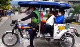 Tarapoto: policía traslada en su mototaxi a varias amas de casa