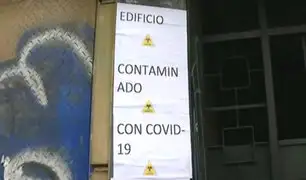 COVID-19: carteles en edificio familiar generan molestia en vecinos