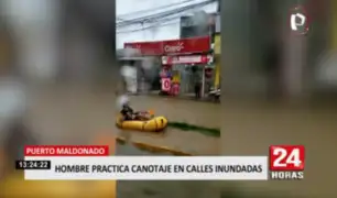Puerto Maldonado: hombre practica canotaje en calles inundadas