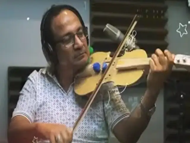 Hombre diseña violín con materiales reciclables para enseñar a niños el arte de la música