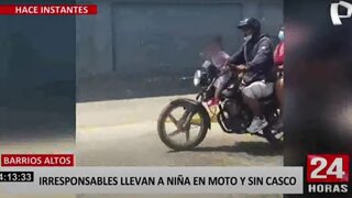 Barrios Altos: irresponsables llevan a niña en moto y sin casco