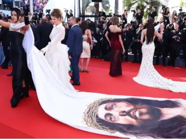 Massiel Taveras empuja a seguridad del Festival de Cannes mientras lucía vestido con imagen de Jesús