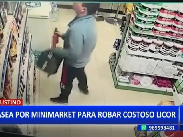 El Agustino: Captan a "tendero" robando costoso licor en minimarket