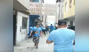 ¿Falsos hinchas? Vándalos con camisetas de Sporting Cristal atacan viviendas en pasaje de SMP