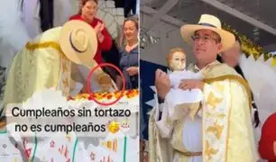 Sacerdote celebra Navidad con tortazo al 'Niño Jesús' y genera polémica en redes